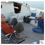 James Wharram and Klaus Hympendahl aboard James catamaran SPIRIT OF GAIA